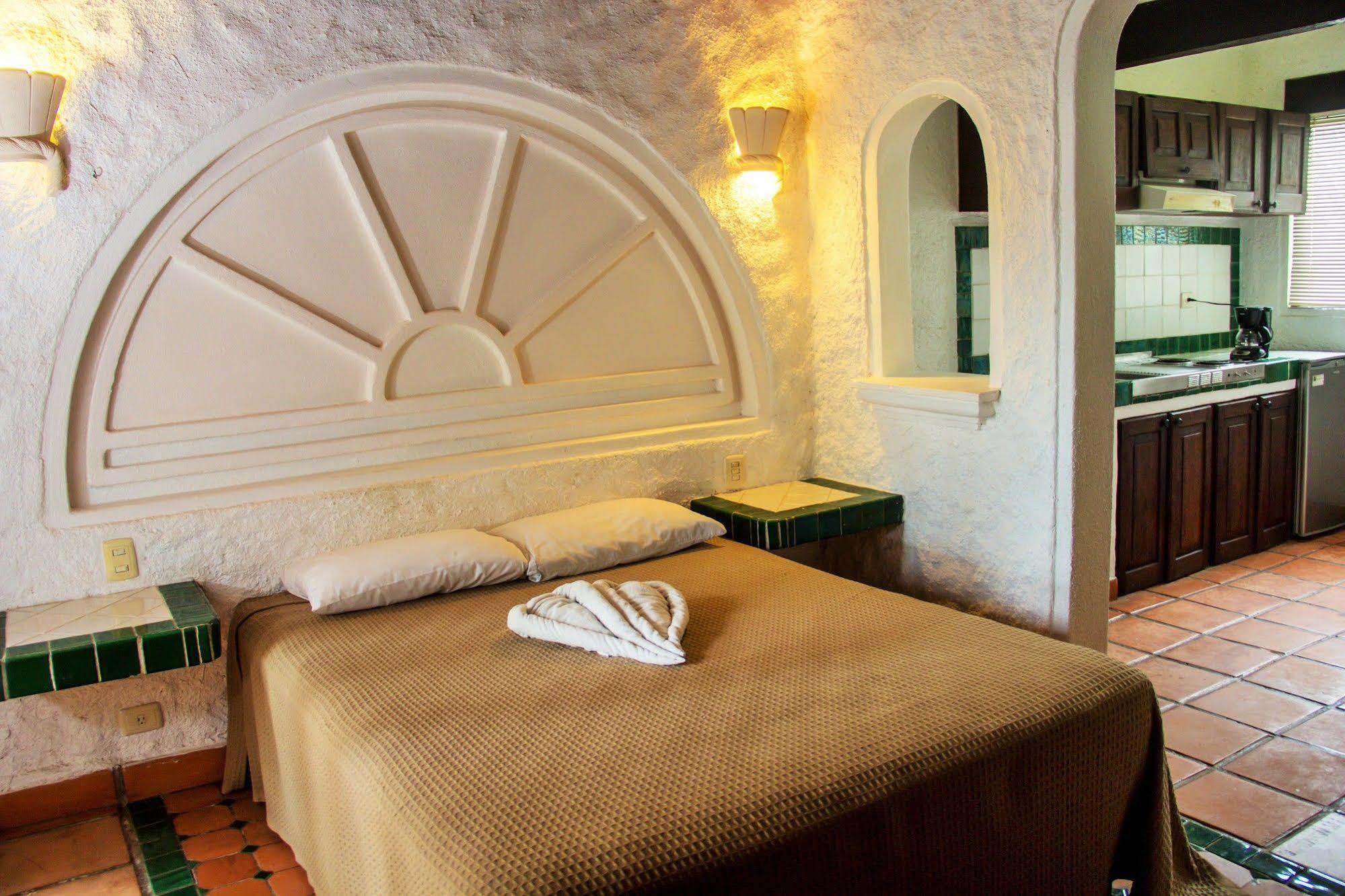 فندق Capital O Mimi Del Mar, بلايا ديل كارمن المظهر الخارجي الصورة A bedroom at the hotel